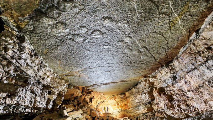 Deep caves are a rich source of dinosaur prints for this paleontologist